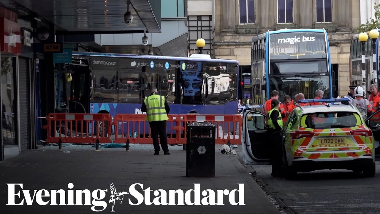 Woman dies after Manchester city centre bus crash