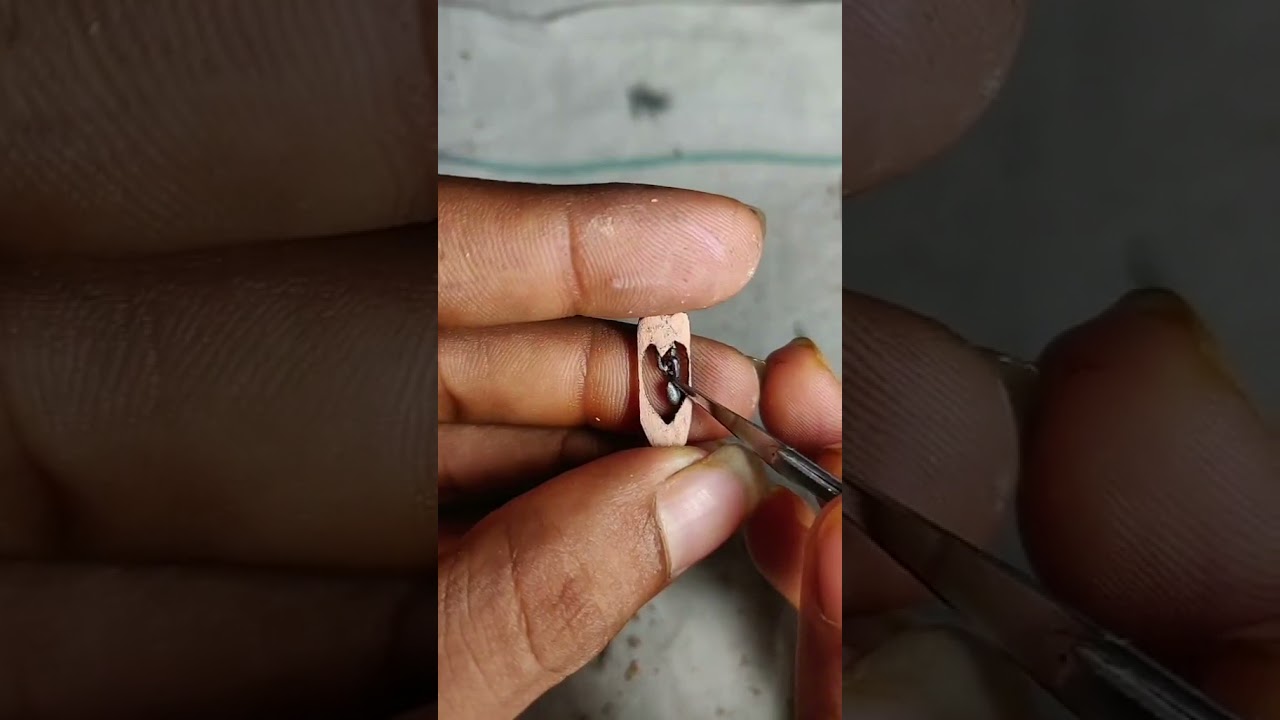 Guy Shows Off Sharp Pencil Carving Skills by Carving Pendant Out of Pencil - 1201747