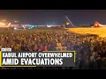 Kabul airport overwhelmed amid evacuations of Afghans after Taliban's siege in country | Afghanistan