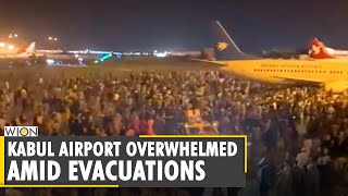 Kabul airport overwhelmed amid evacuations of Afghans after Taliban's siege in country | Afghanistan