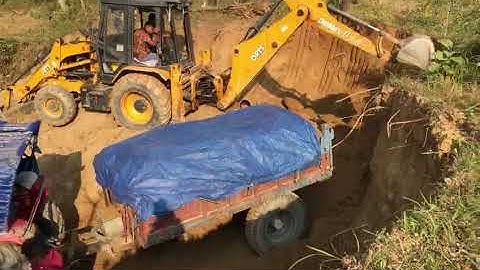 3DX Escort machine loading soil in tractors @roadtrendmachinework