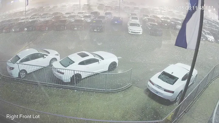 Surveillance video of baseball-sized hail damaging...