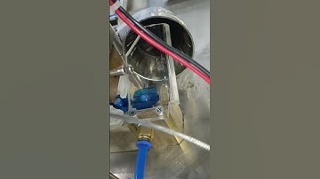 Injection port Assembly machine product release system