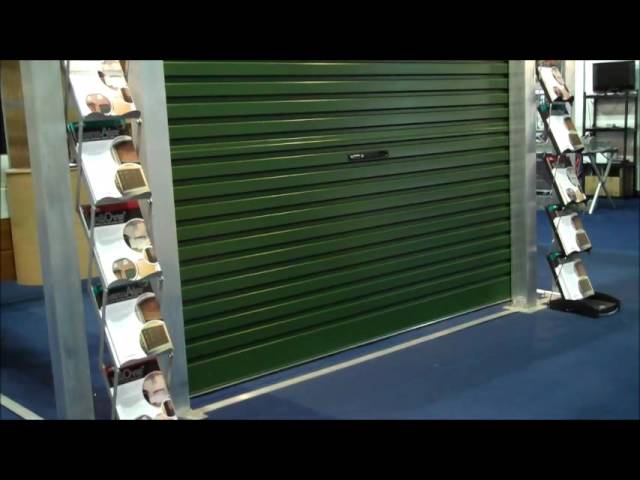 TiltAdor's Juniper Green Roller Garage Door with Automation