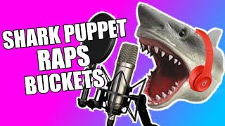 Shark puppet sings buckets