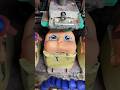 Dolls in a toy factory have their face painted by large machines #shorts