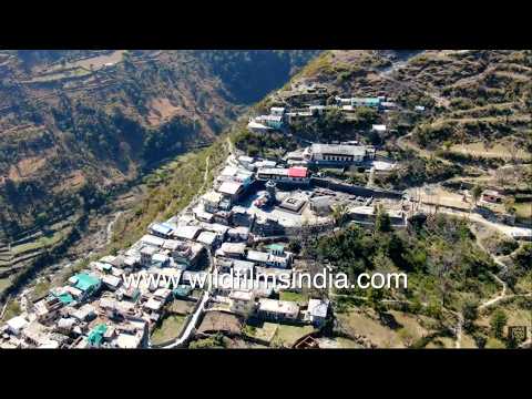 Lakhamandal pilgrimage site amid green hills and terrace farming in Uttarakhand