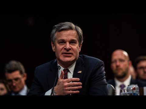 FBI director distances himself from Barr ‘spying’ claim