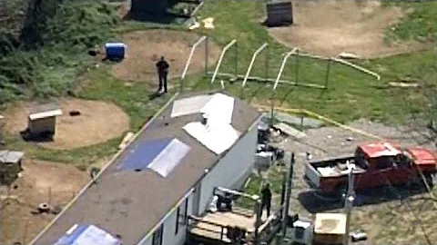 Manhunt and search for motive in Ohio family's mur...