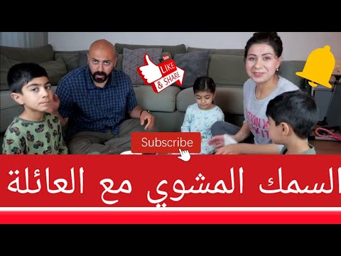عراقي يأكل بشراهة السمك المشوي