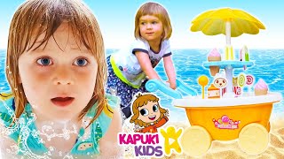 Kids' activities at the beach \& color changing hair! Brother and sister playing with toys for kids
