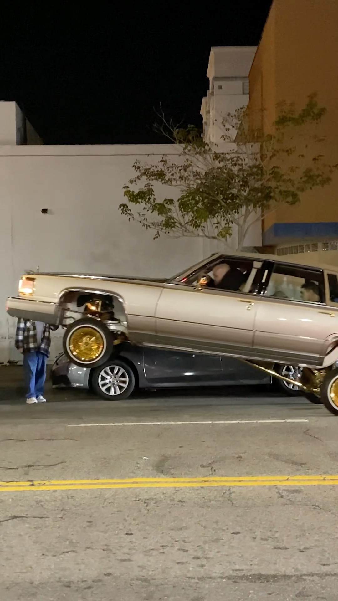 Classic Cadillac LOWRIDER HOPPING & DROPPING BACK DOWN with that