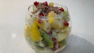 Quick fruit salad with yogurt. Beautiful presentation of fruit salad. Tasty and healthy.