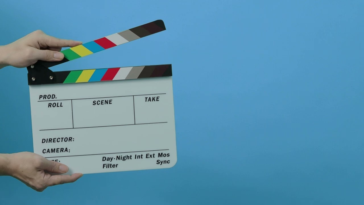 movie film slate close up hand clapping empty film slate