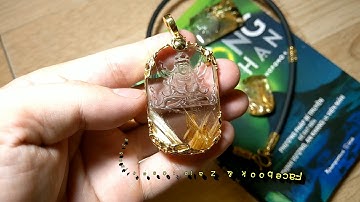 Mặt thạch anh tóc vàng bã mía trong vắt tạc Quan Âm bọc vàng 18K(2,486 chỉ)