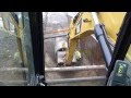 Cat 330d digging and laying 60" concrete drain pipe