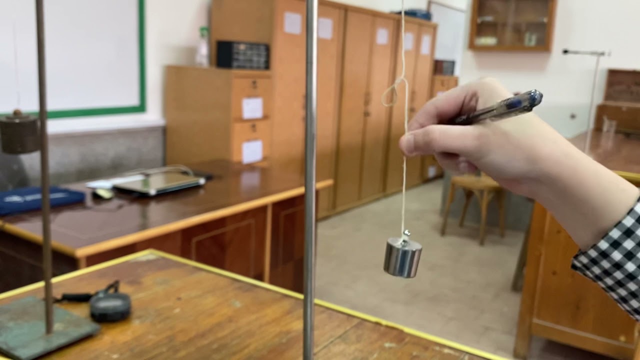 نظرى- تجربة تعيين عجلة الجاذبية الارضية بإستخدام البندول البسيط