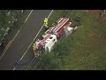 Sky 5: Firetruck overturns on Covered Bridge Road in Clayton
