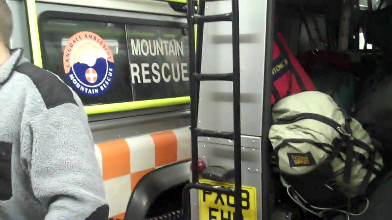 Nick showing us around the mountain rescue Land Rovers