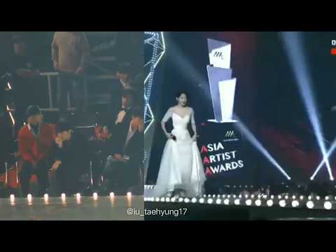 Taehyung reaction to IU speech at AAA 2018