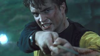 HARRY POTTER: ROBERT PATTINSON EXPLAINS WHY HIS CHARACTER HELD HIS WAND DIFFERENTLY