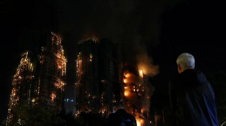 Death toll rises dramatically in Hong Kong fires, hundreds missing | REUTERS