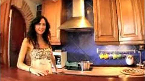 Berta Hernandez giving the camera a tour of her ap...