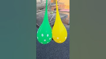 Experiment: Will a water balloon explode if it rolls down a tall building? 💥🎈 #balloon