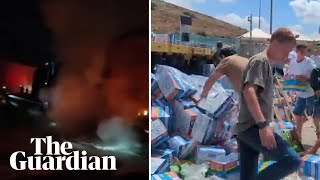 Gaza-bound aid trucks set on fire and looted in West Bank