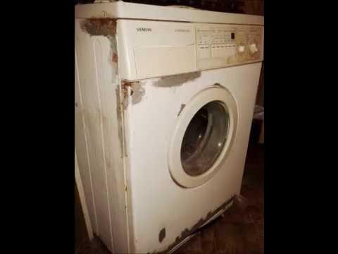 Стиральная машина поломанная. Горящая стиральная машина. Старинная стиральная машина. Стиральная машина на мусорке. Разбитая стиральная машинка.