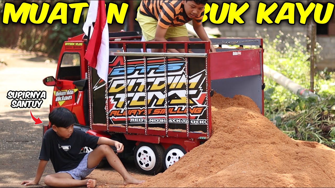 MUATAN SERBUK KAYU!! DITDIM SEMANGAT BANTU MUATAN BERAT DEMI LOMBA AGUSTUSAN