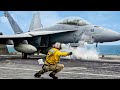 Reasons Why Navy Sailors Kneel Right Next to A Plane Taking Off on An Aircraft Carrier