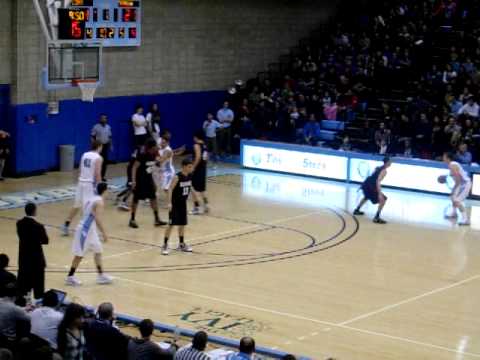 Harvard's Jeremy Lin passes to Oliver McNally for the 3 pointer; Lin forces a TO