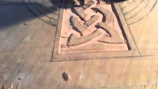 Carving a Celtic cross with knotwork Celtic woodcarving. Carving knotwork into a Celtic cross.