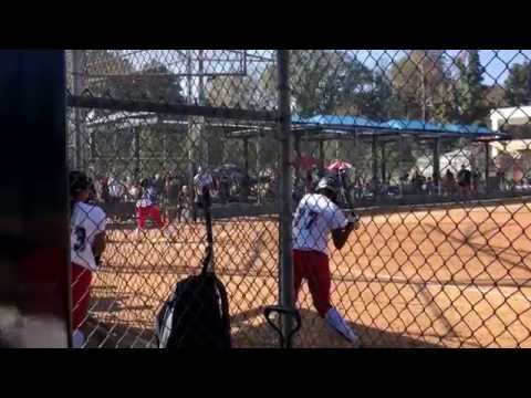 Corissa with a base hit to right center