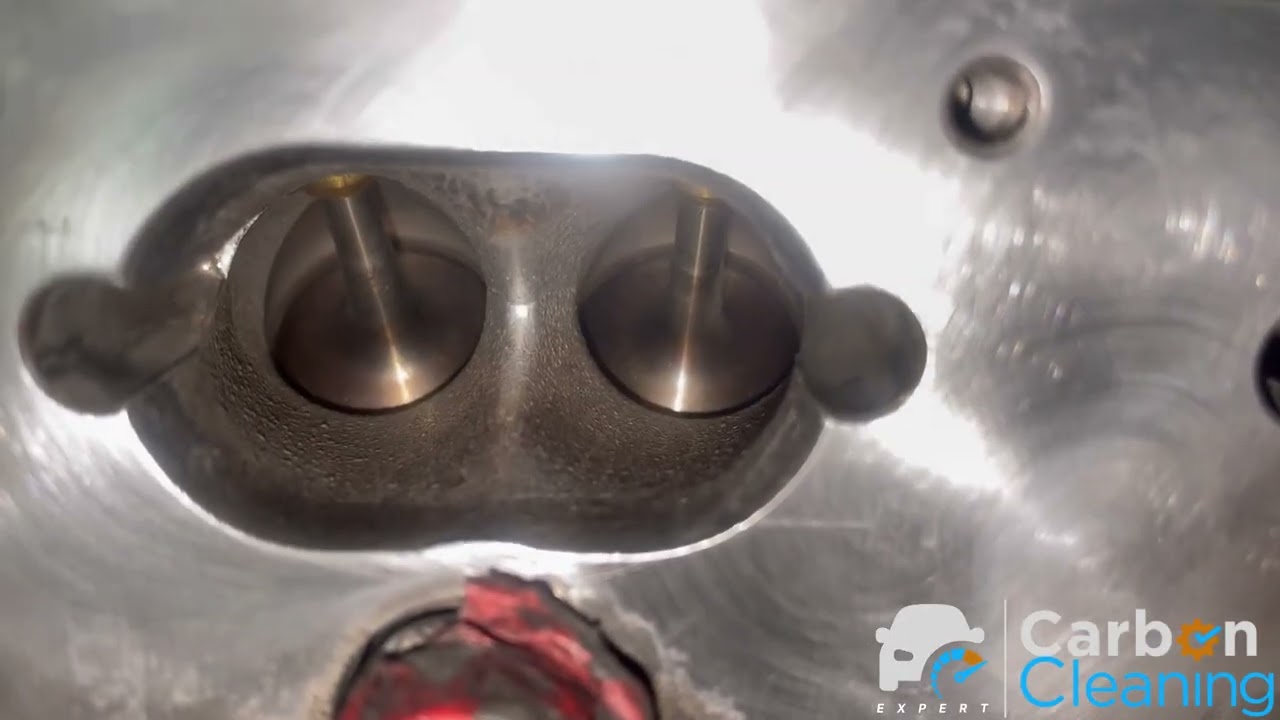VW Golf cylinder head with the intake off, ports walnut-blasted back to clean metal at the Kings Park workshop