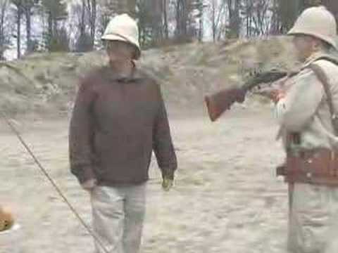 Jeb Bradley tries out an elephant gun at the GO-NH shoot in Pelham NH.