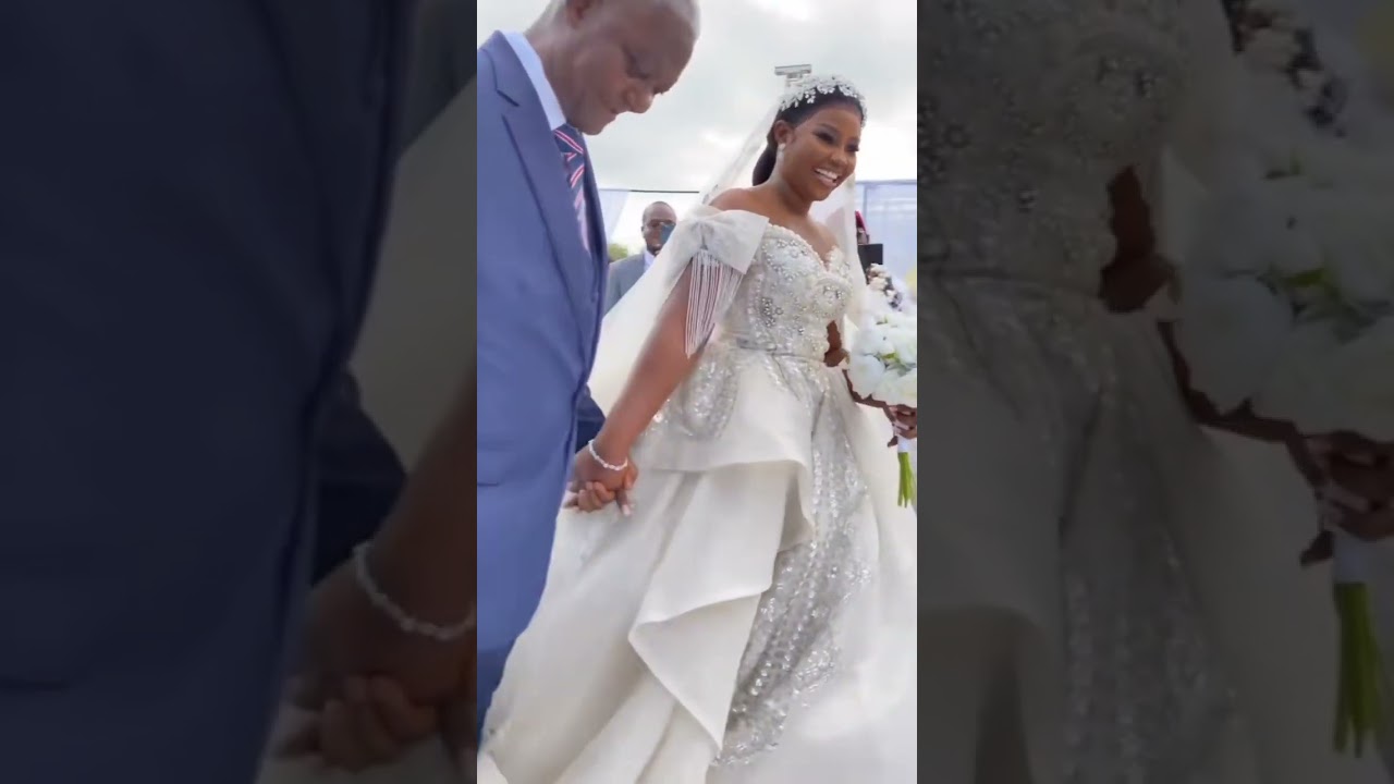 Father and daughter walk down the aisle 