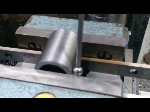 Using a wiggler to find the edge of a metal bushing