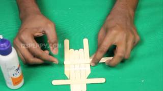 How to Make a Popsicle Stick Sled http://crafts.123peppy.com/a-popsicle-stick-sled/435 Let us Learn How to Make a Popsicle Stick Sled For Step by Step and Materials