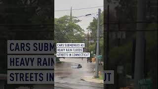 Heavy rain floods streets and submerges cars in Connecticut
