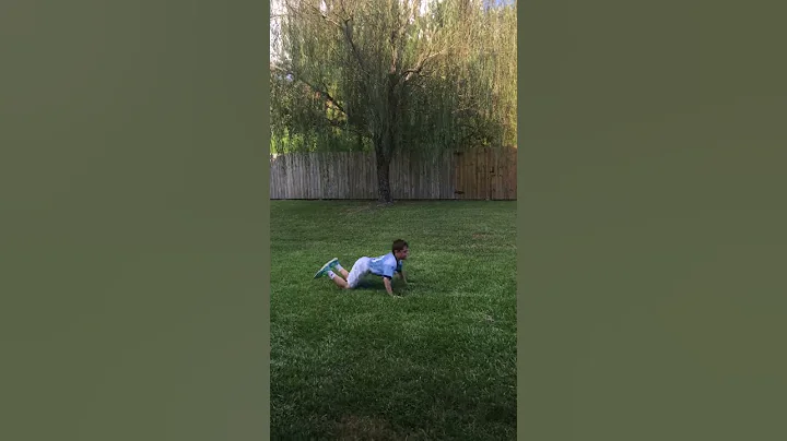 Kid trying to do the worm