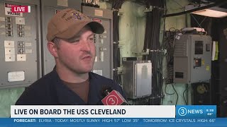Climbing aboard the USS Cleveland