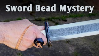 The Sword Bead Mystery