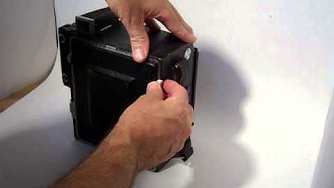 How to open the door of a Graflex camera that will not open
