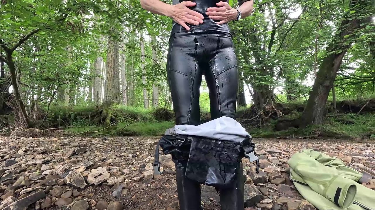 Video 106 - Oh, the irony - Taster (chest waders, riding boots, leather pants, wetlook, swim, river)
