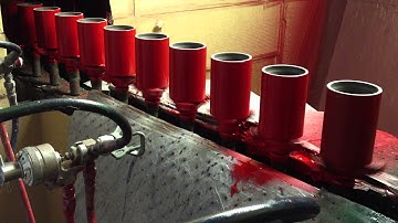 API Coupling Painting (Air Spray) on a Chain-On-Edge Conveyor