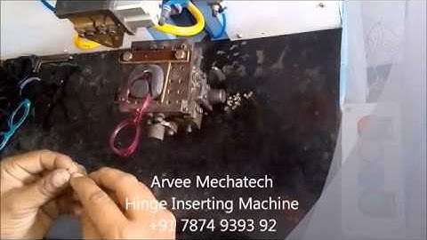 Hinge inserting machine
