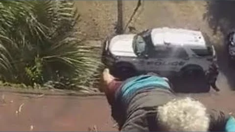 Tampa man dangling from 3-story home from blowing leaves rescued by officers