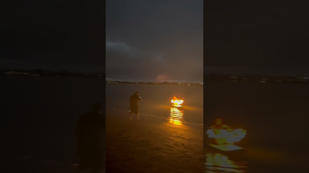 Fire spinning on a surfboard🔥🏄🏾‍♂️